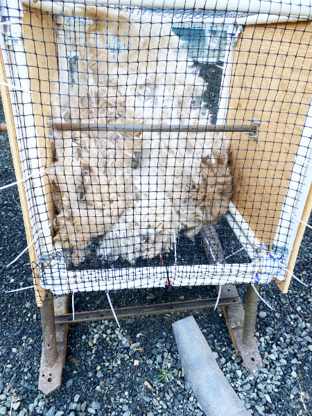 fiber swirling in the air inside the tumble box